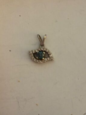 white gold pave’ diamond evil eye pendant